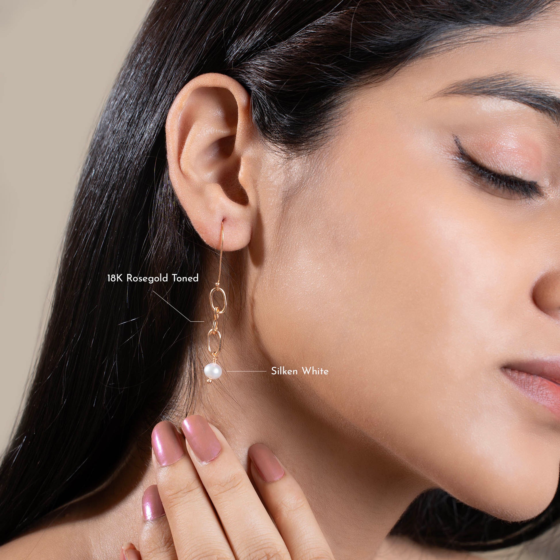 OVAL LINK PEARL DROP EARRING FRONT VIEW ON MODEL 1