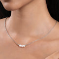 Minimalist three pearl necklace in 925 silver on model
