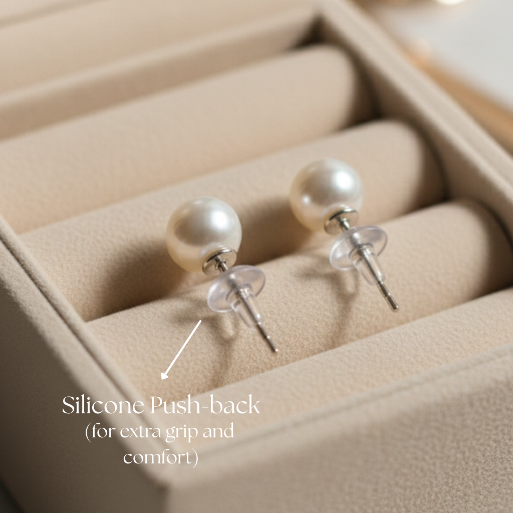 Pearl earrings with silicone push backs in a jewelry box